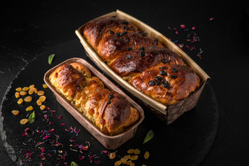 Easter cake with raisins, nuts, poppy seeds, chocolate. Holiday pastries.