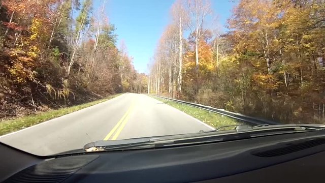 Car ride on a beautiful sunny fall day along the Cherohala Skyway in mountains of Tennessee
