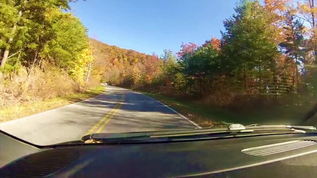 Car ride on a beautiful sunny fall day along the Cherohala Skyway in mountains of Tennessee