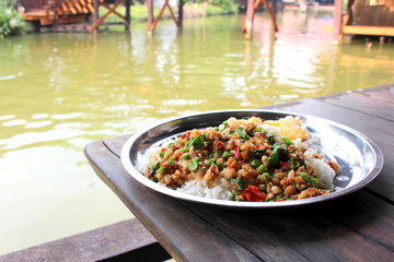 Fried Stir Basil with Minced pork at Ayodhaya floating market.