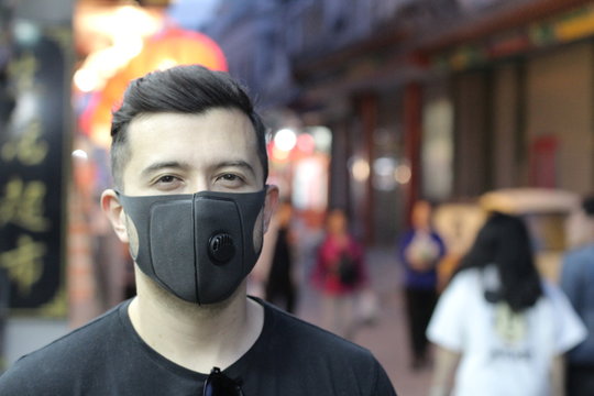 Urban Picture Of Young Man With Pollution Mask