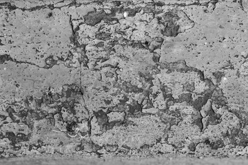 The concrete texture, wall, with cracks and scratches can be used as a  background, web banner with...