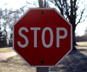 A close view of the red stop sign.