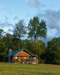 Obraz premium Golden Hour Log Cabin