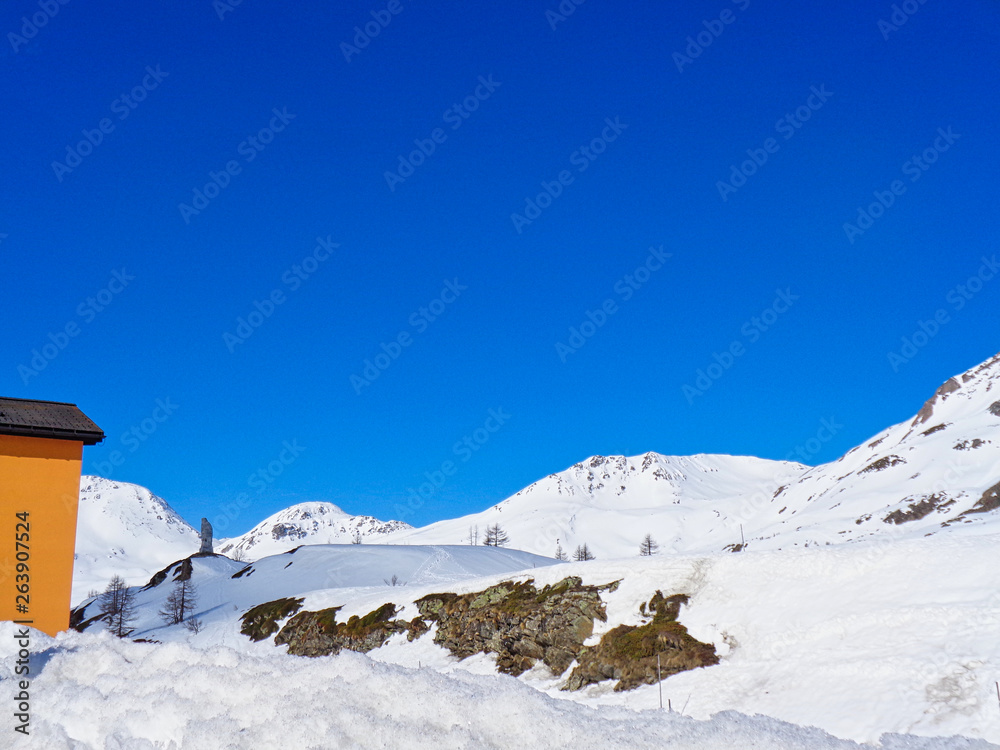 Sticker snowy mountains on the top