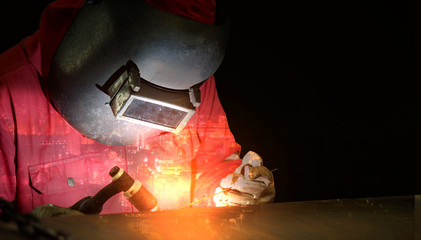 Welding with sparks by Process Argon,Double exposure,Copy space for you text.