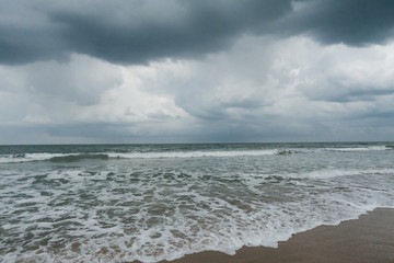 Storm clouds over the ocean on a beach in South Florida.