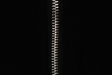 zipper lock or clothes lock on black fabric