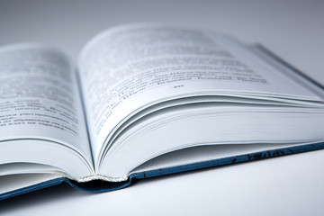 new open book with on a gray table