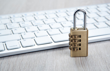 padlock with a computer keyboard Internet security concept