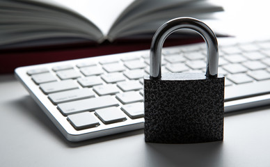 padlock with a computer keyboard Internet security concept