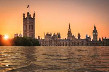 Digital manipulation of flooded Houses of parliament at sunset, London, UK