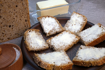 Small sandwiches on homemade bread with butter