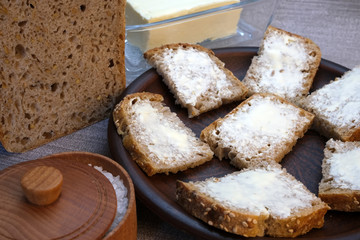 Small sandwiches on homemade bread with butter