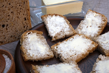 Small sandwiches on homemade bread with butter