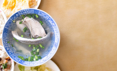 Milkfish skin soup, distinctive Taiwan delicacy food in Tainan. Famous meal set for lunch or breakfast with vegetable, top view, copy space, close up