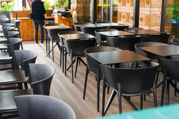 outdoor furniture in the on-site restaurant, tables and chairs