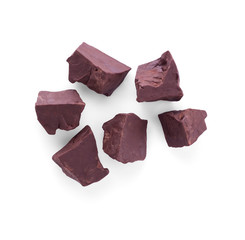 Large pieces of dark chocolate isolated on white background