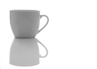 cup with reflection on white background