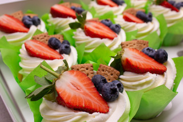 Strawberry and blueberry cupcake