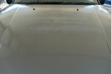 Fading car paint colour on engine bonnet section. Car clear coat damage 