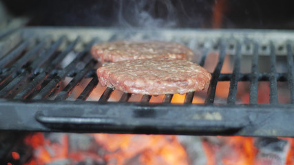 Cooking beef and pork patty for burger. Meat roasted at kitchen.
