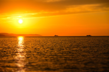 Fototapeta premium Beautiful landscape. Sunset over the sea.