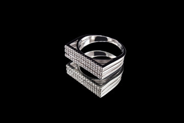 White gold ring with mirror reflection. Macro shooting