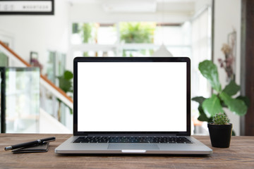 Fototapeta premium Desk Laptop with blank screen on table