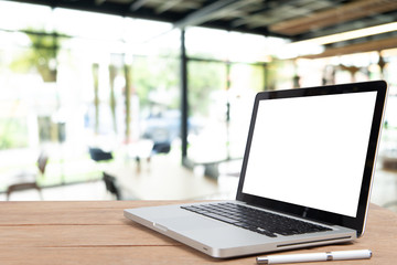 Desk Laptop with blank screen on table