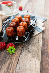 Canele is a small French pastry with rum and vanilla