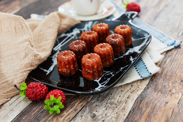 Canele is a small French pastry with rum and vanilla