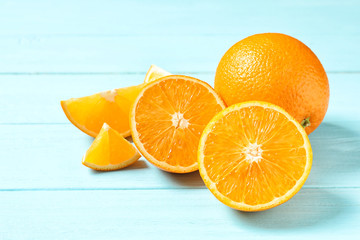 Fresh oranges on wooden background. Healthy fruits