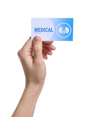 Fototapeta premium Woman holding medical business card isolated on white, closeup. Nephrology service