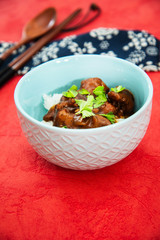 Asian style caramel pork with rice and vegetable