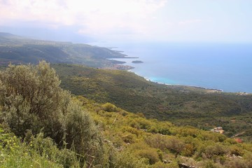Lush vegetation and coastline in the Inner Mani in spring.  Peloponnese, Greece, South-east Europe.