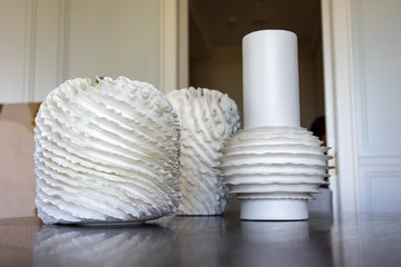 Fototapeta na wymiar beautiful white vase on a wooden table