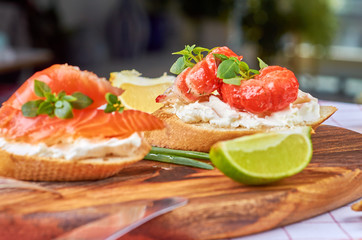 Delicious snacks with shrimp, fish and avocado