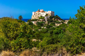 Fototapeta na wymiar Castle on the mountain near the sea in Crete