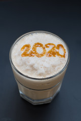 Ice coffee blender and number 2020 on top. Happy new year concept