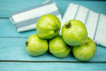 Fresh guava on blue wooden background