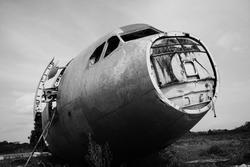 the abandoned airplane in black and white