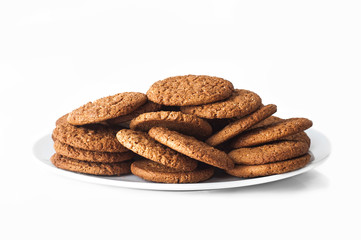 Oatmeal cookies in a plate on a white background. Close