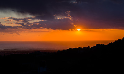 This is a capture of a sunset in Beirut and you can see the orange color formed by the sun and the beautiful horizon