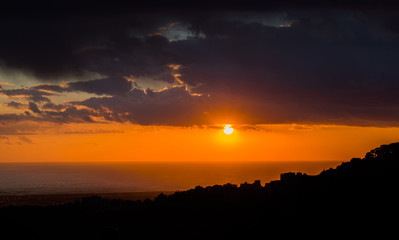 This is a capture of a sunset in Beirut and you can see the orange color formed by the sun and the beautiful horizon