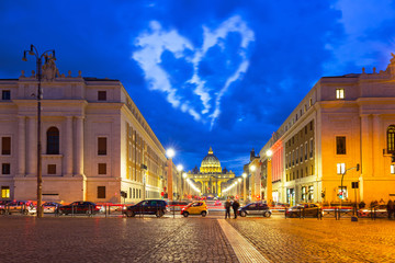 Heart shape clouds over the St. Peter's Basilica in Vatican City, Italy