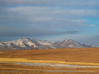 Car window scenery of Qinghai–Tibet railway in Tibet Autonomous Region, China.