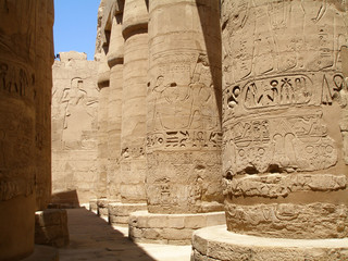 Hieroglyphs on pillars of the Great hypostyle hall at the Karnak temple of Amun-Ra, Luxor....