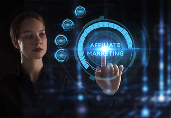 The concept of business, technology, the Internet and the network. A young entrepreneur working on a virtual screen of the future and sees the inscription: Affiliate marketing