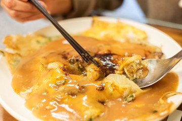 at traditional Taiwanese snack of oyster omelet